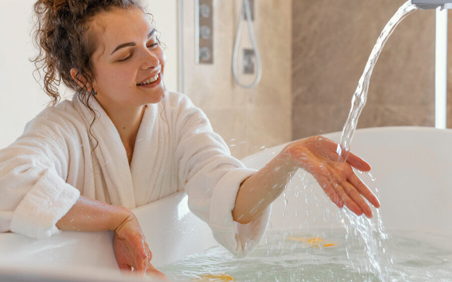 Woman enjoying a relaxing bath experience.
